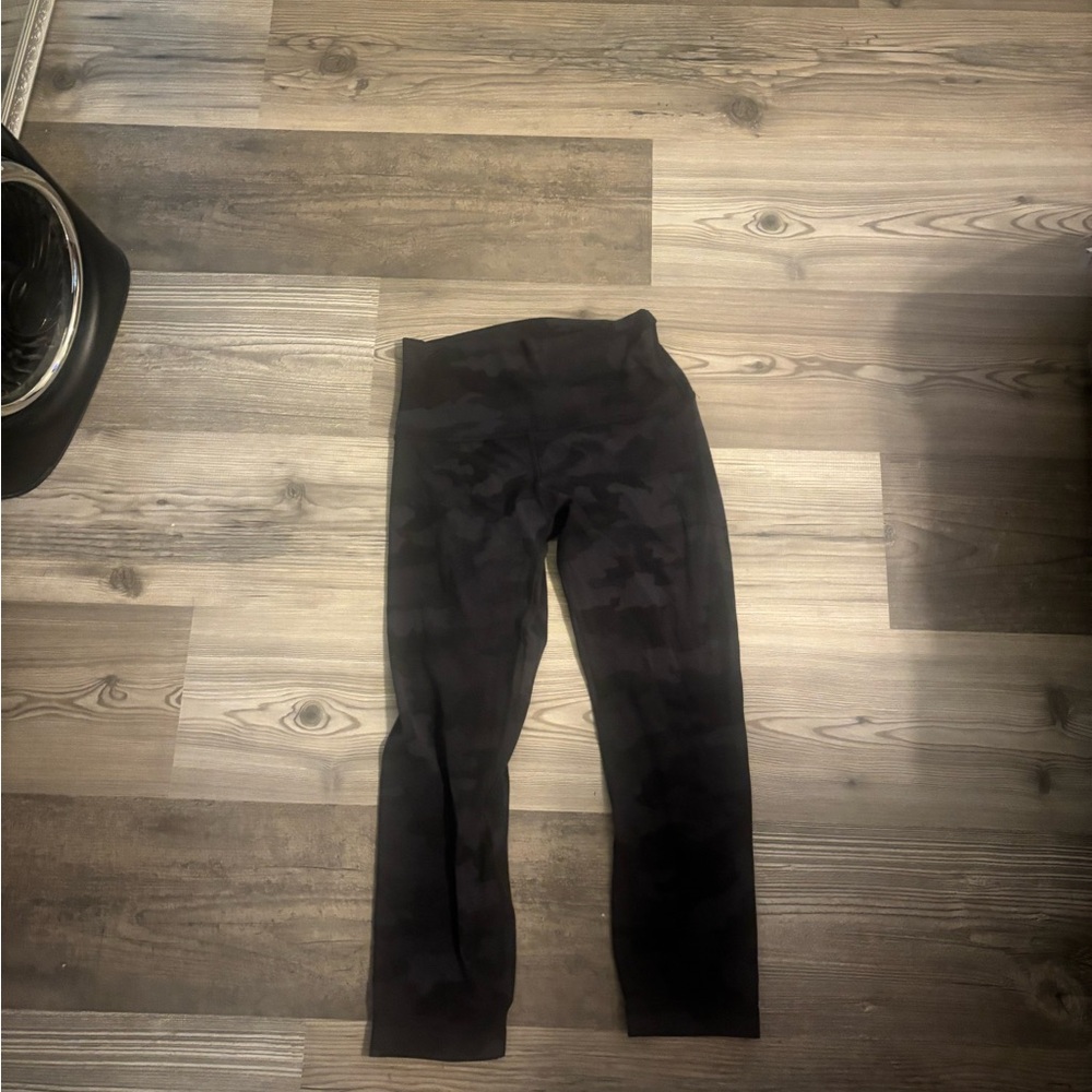 Set of 2 Lululemon leggings cropped- one gray camo and the other gray.